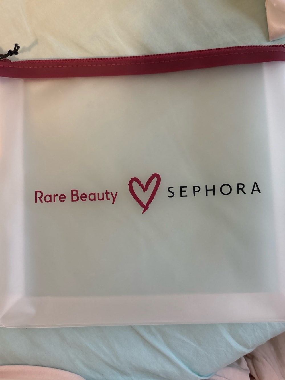 Rare Beauty Clear Cosmetic Pouch in Pink